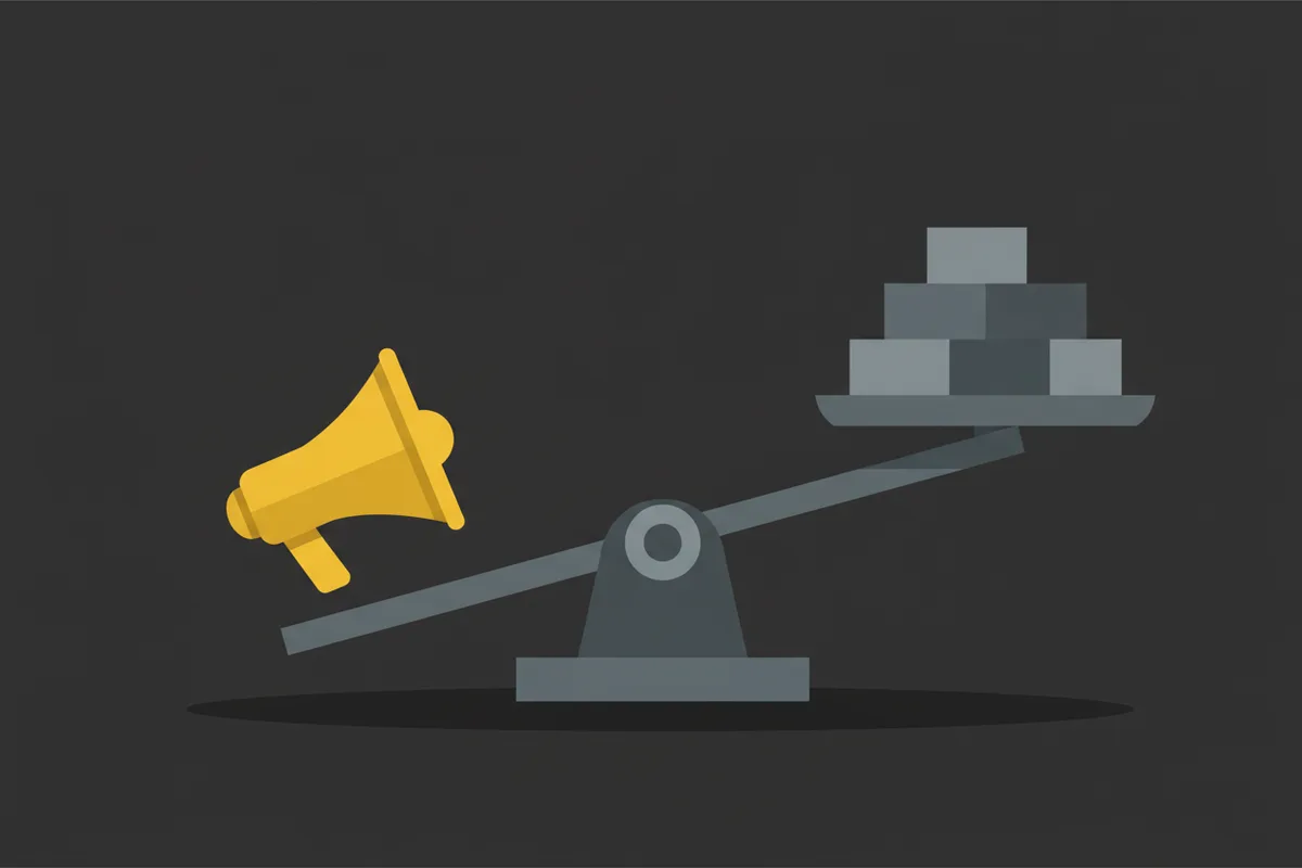 A balance scale where a single megaphone outweighs a pile of other blocks